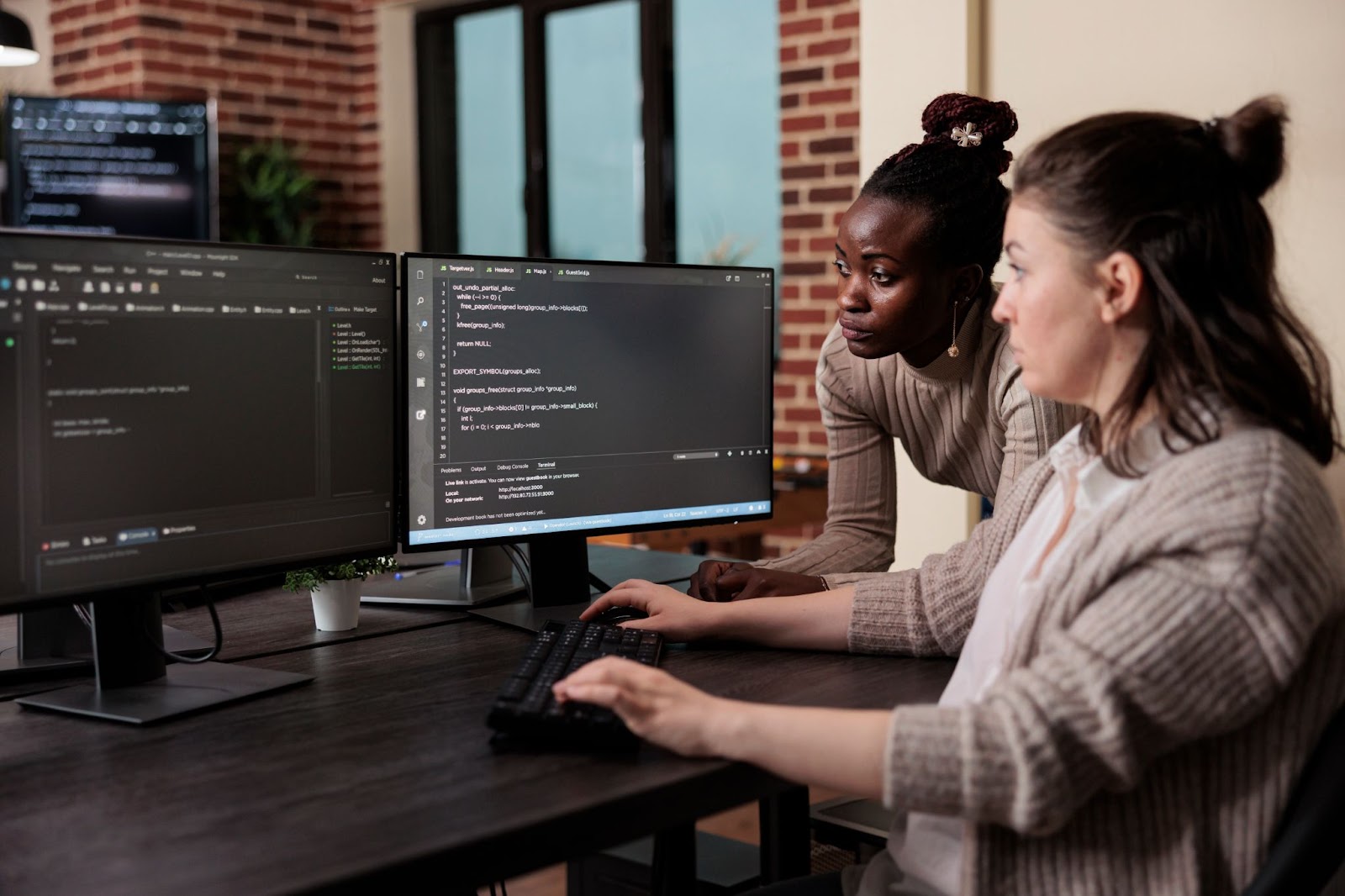 Two women working together on a project